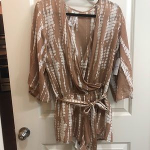 Tan printed ROMPER. Size small.